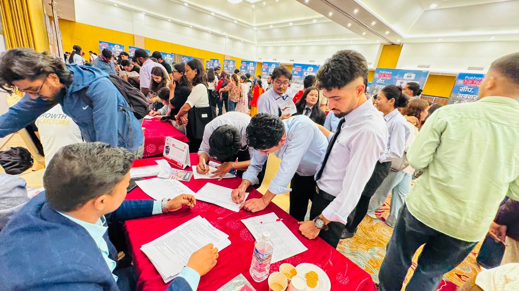 Registering at one of the job fair stalls