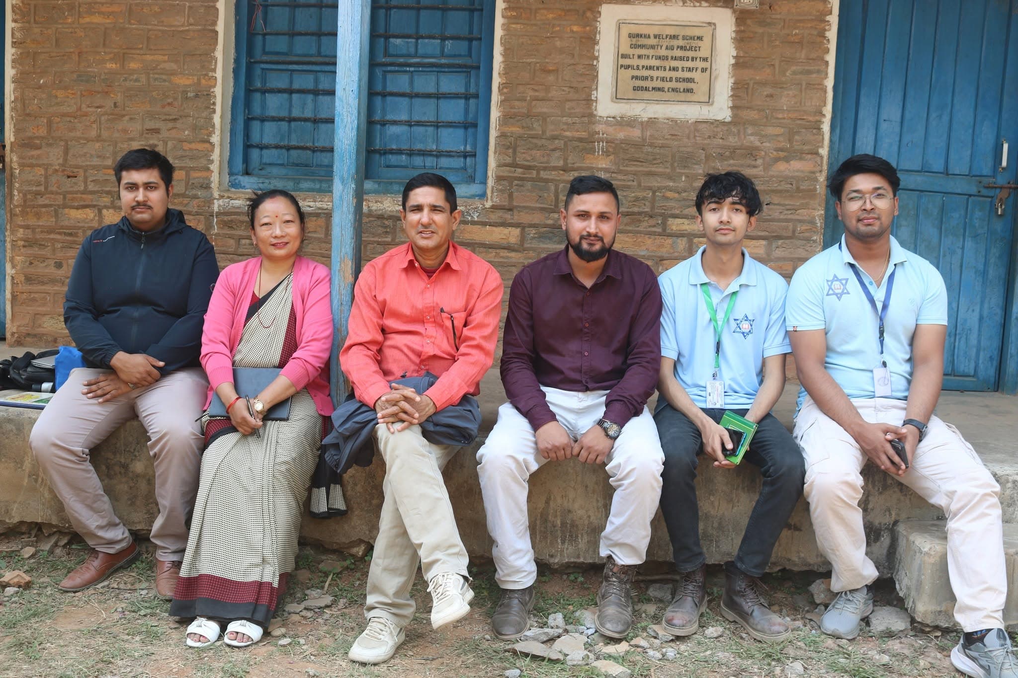 Students and teachers outside the venue in Rumsi