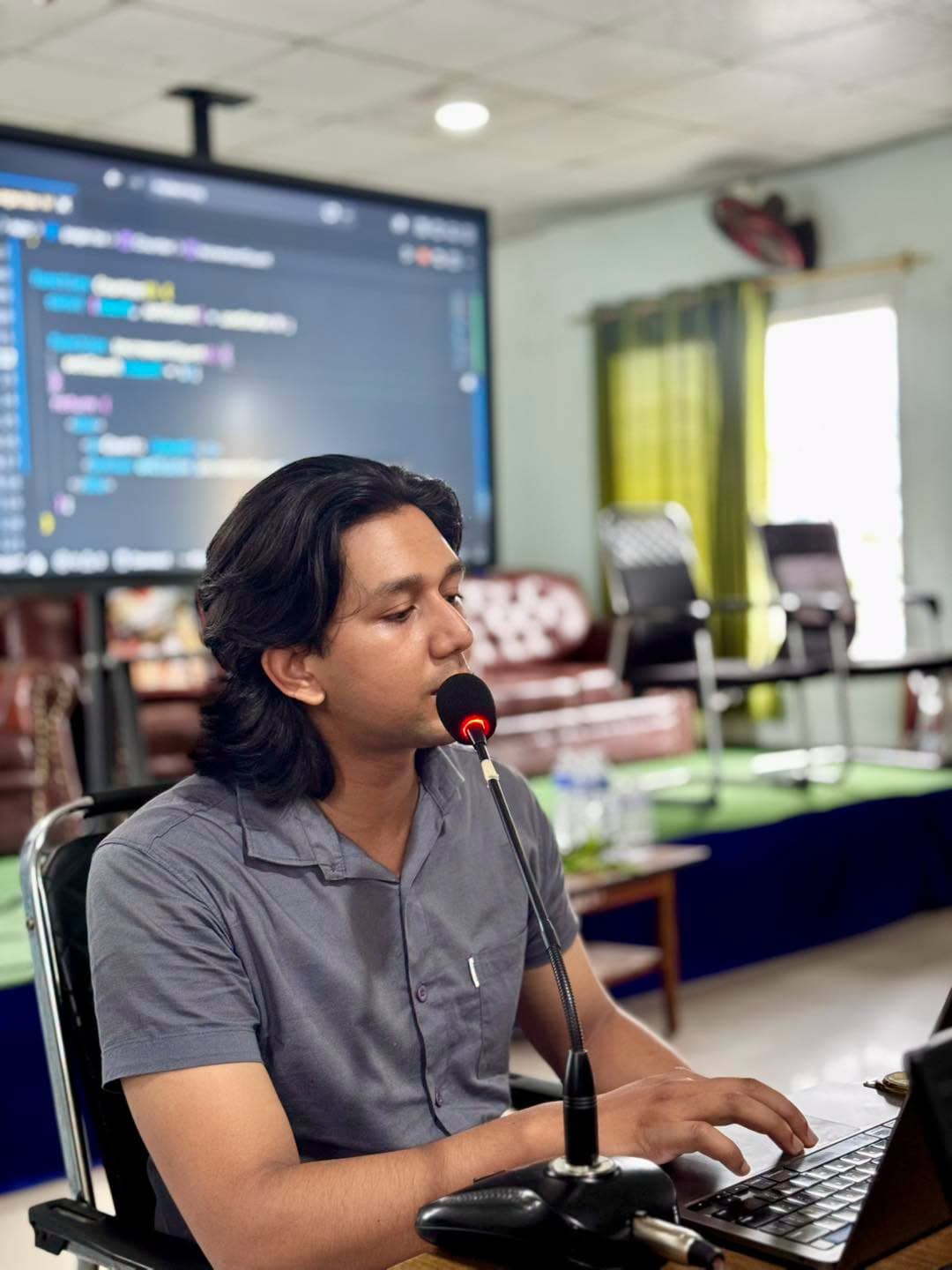 The instructor talking the session through a live coding example