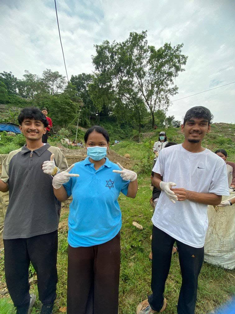 Members taking a break from the cleanup