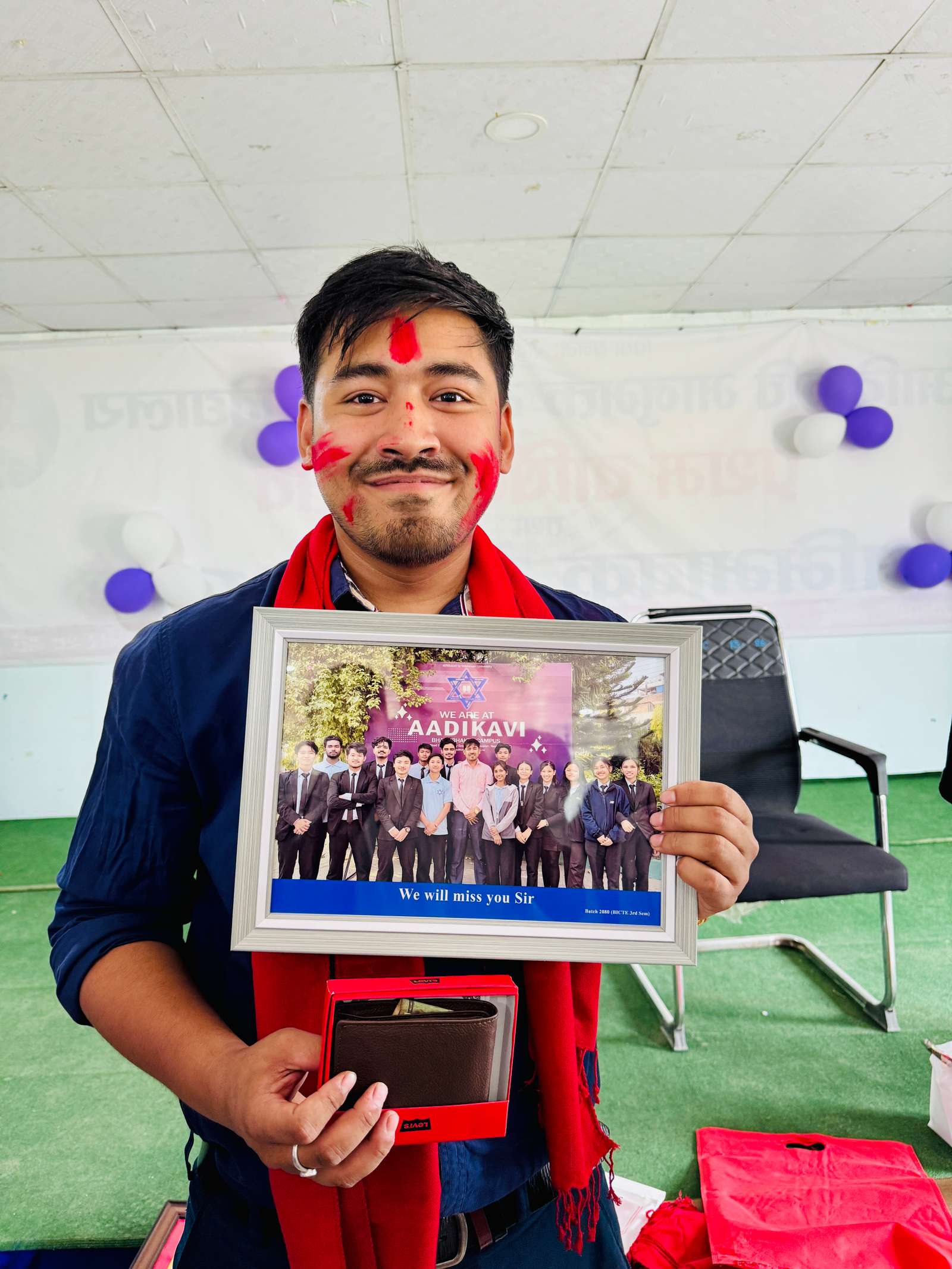 Er. Anmol Pradhan with the gifts from his students