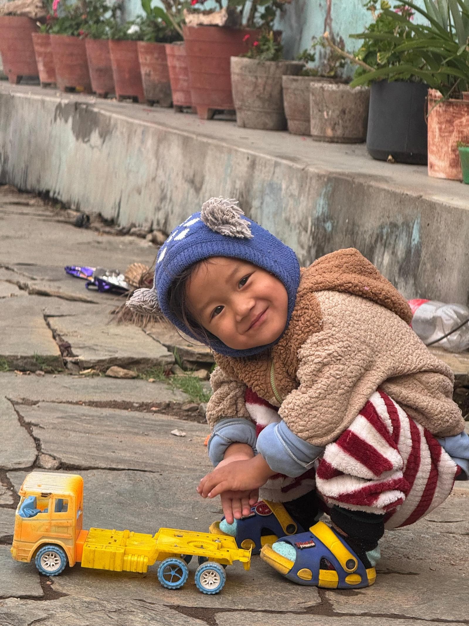 A child at play in the village