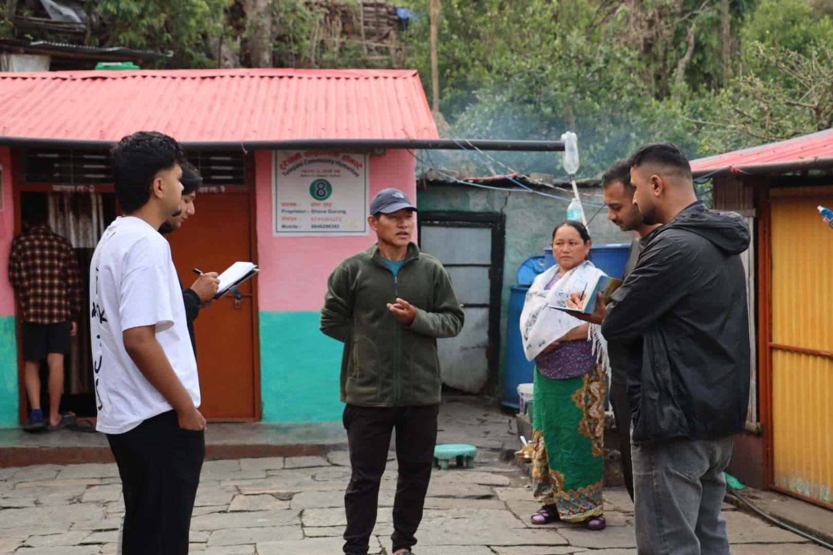 The team interviewing residents during the data collection visit