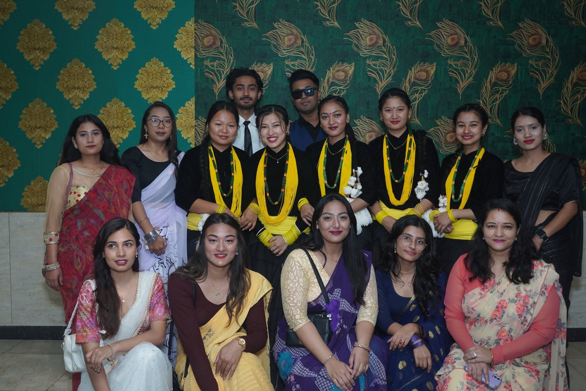 Students in saree and cultural attire at the programme