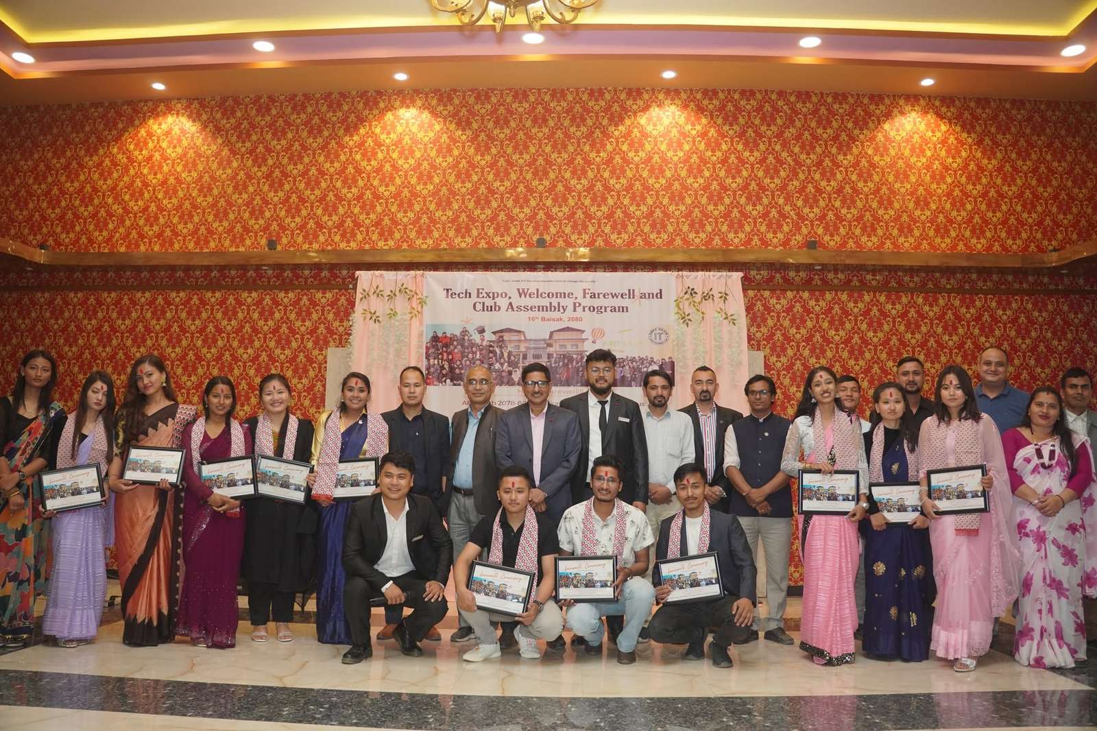 Graduating students with their farewell frames
